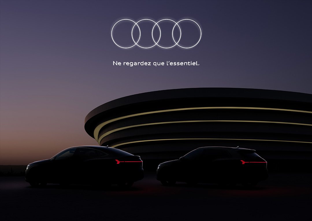 Audi campaign visual: two cars at dusk in front of a circular building