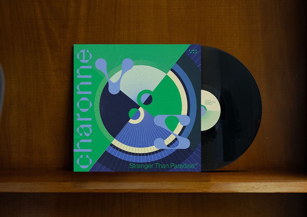 Record sleeve for Charonne's "Stranger Than Paradise" EP on a wooden shelf